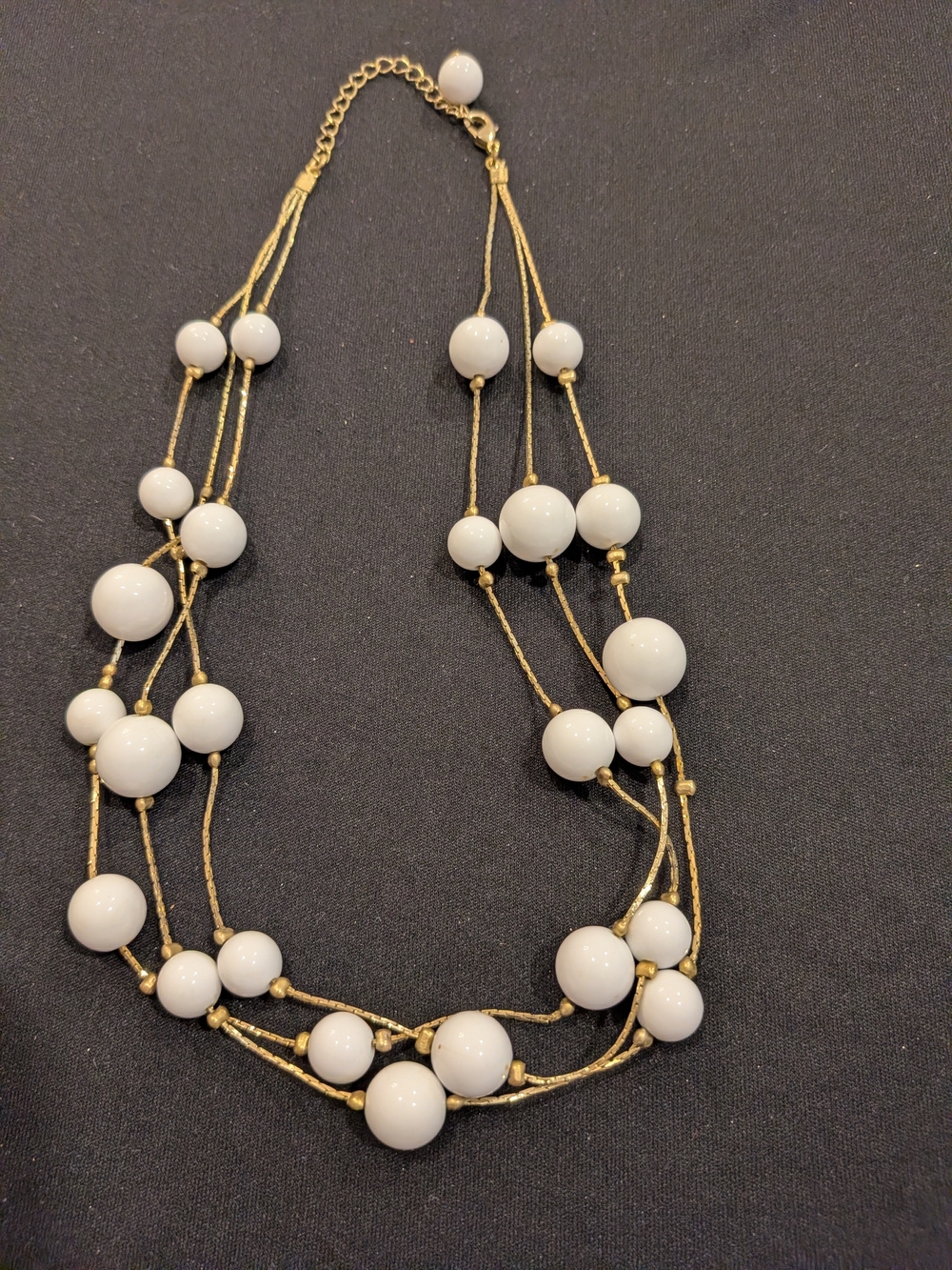 White Beaded Multi-Strand Necklace 9.5". - Elegant Gold Tone Accent